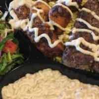 9: Lula Kabob Plate · Beef minced with onions and our house spices, broiled to perfection, and served with, salad,...