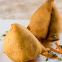 Vegetable Samosas (2 Per Order) · Triangular patties stuffed with potatoes & green peas and nuts.