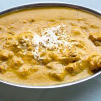 Lamb Korma · A cashew nut based lamb curry, flavored with nutmeg.