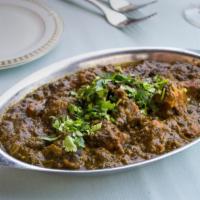 Sag Lamb · Lamb cooked in spinach in a mildly spiced gravy.