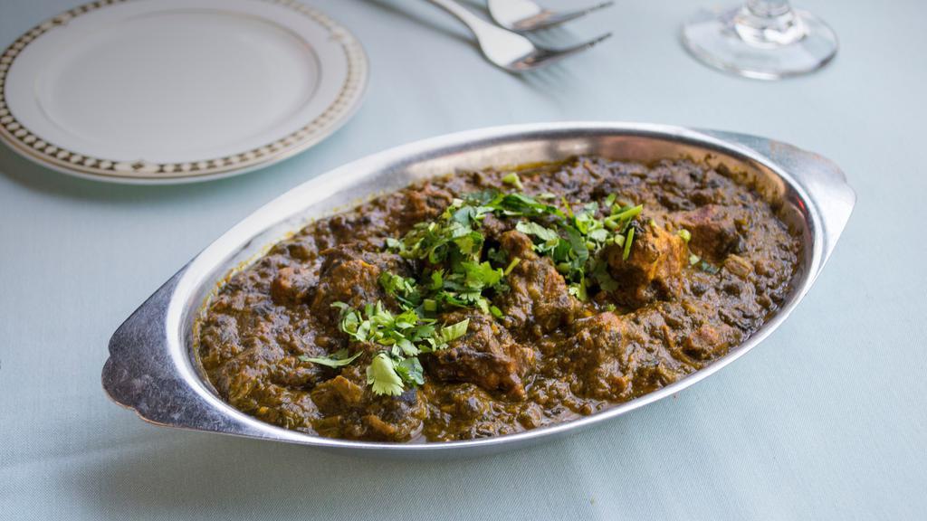 Sag Lamb · Lamb cooked in spinach in a mildly spiced gravy.