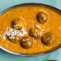 Malai Kofta · Fresh grated vegetables cooked in grain flour, butter and deep fried, served in a fresh crea...