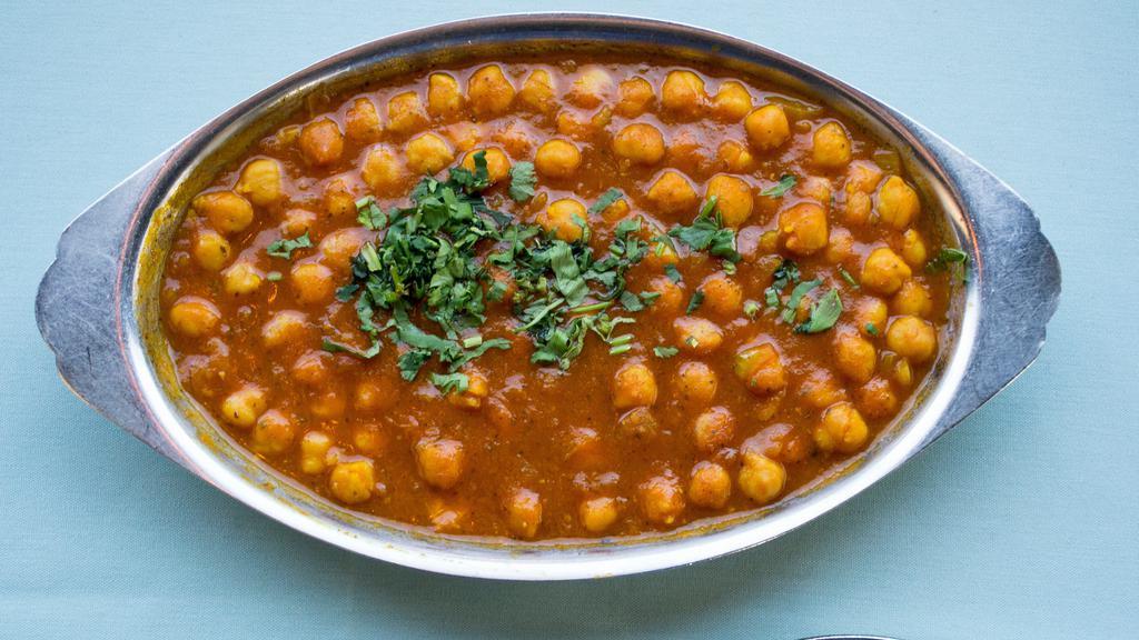 Chana Masala · Garbanzo beans with ginger in a specially spiced sauce.