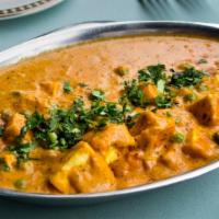 Mutter Paneer · Chunks of homemade cheese and green peas cooked with herbs and spices.