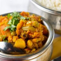 Baigan Bharta · Eggplant roasted in a clay pot and cooked with green onions, garlic, bell pepper, herbs and ...