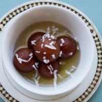 Gulab Jamun · Juicy balls made from cream of milk in light syrup.