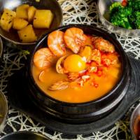  Dumpling Tofu Soup (만두 순두부) · Korean soft tofu soup with dumplings.
Choose your spicy level. 

Includes (1) side of steame...