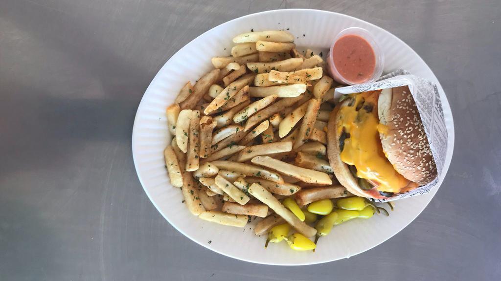 Cheese Burger Combo · Comes with lettuce, tomatoes, onion, pickles, and thousand island dressing. Served with fries and a drink.