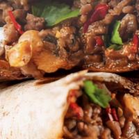 Camaron Burrito · Shrimp burrito. Comes with rice, beans, onion, cilantro, lettuce, tomato.