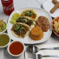 Taco Plate · 3 tacos choose of meat (steak, chicken, carnitas, al pastor, or veggies) limes, with cilantr...