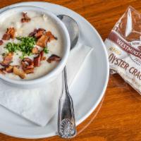 Bowl Of Clam Chowder · With chopped bacon and parsley.