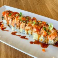 Baked Salmon Roll · Baked salomon with masago and green onion on cream cheese CA roll.