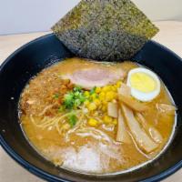 Miso Ramen Noodles · Thin noodle, miso based soup, served with chashu pork, hard boiled egg, crispy onion chips, ...