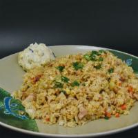 Chicken Fried Rice · Our homemade chicken fried rice made with steamed white rice, dark meat chicken, eggs, carro...