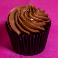 Chocolaty Salty Caramel · Chocolate cupcake filled with caramel, frosted with sea salt chocolate buttercream, topped w...