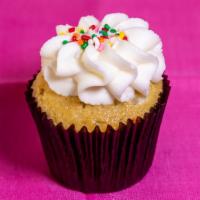 Birthday Cake · Birthday cake flavored cupcake baked with rainbow sprinkles inside the cake, frosted with a ...