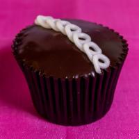 Old School · Chocolate cupcake filled with fresh whipped cream, topped with chocolate ganache, garnished ...