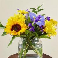 Flutter By · The cheerful Flutter By Bouquet is guaranteed to make every recipient smile. Designed with e...