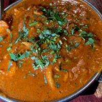 Karahi Chicken · Boneless chicken cooked with garlic, ginger, tomatoes and spices.
