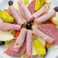 Antipasto Salad · Served with iceberg lettuce, tomatoes, olives, giardiniera, pepperoncini, salami, mortadella...