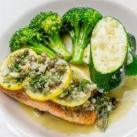 Salmon Piccata · Pan-seared salmon topped with sautéed garlic, butter, capers, parsley, and lemon sauce. Serv...