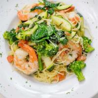 Capellini Con Shrimp · Angel hair pasta tossed with grilled shrimp, tomatoes, zucchini, broccoli, spinach, basil, g...