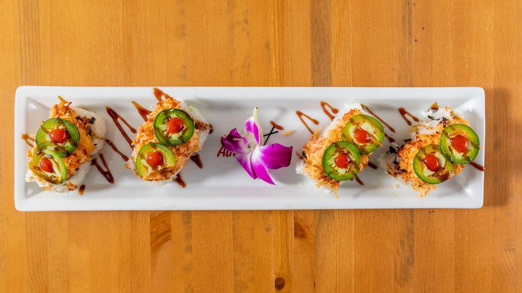 Da Bomb · In: shrimp tempura, spicy tuna, and avocado. Top: baked krab, baked scallop and jalapeño. Eel sauce, sriracha. These items are served raw or undercooked or may contain raw or uncooked ingredients.