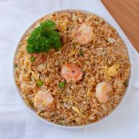 Shrimp Fried Rice · Shrimp, peas and carrots, eggs, scallions in fried rice.