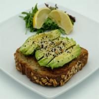 Avocado Toast · Thick cut organic multigrain, avocado, everthing seasoning, slice of lemon