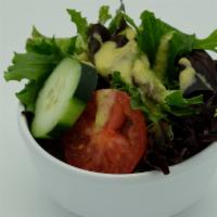 Mixed Green Salad · organic mixed green salad a tropical herb dressing