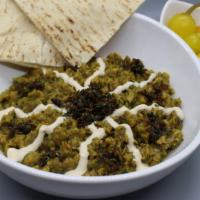 Kashke Bademjan · Eggplant dip. Smashed fried eggplants topped with fried onions, fried dried mint, garlic and...