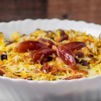 Shirin Polo – Sweet Rice · Shirin polo is our traditional basmati rice with saffron orange zest raisins slivered almond...