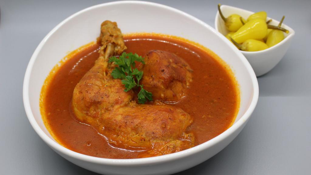 Saffron Chicken · Each order comes with one chicken breast and one chicken leg slow braised with saffron tomatoes and onions. Does not include white rice.