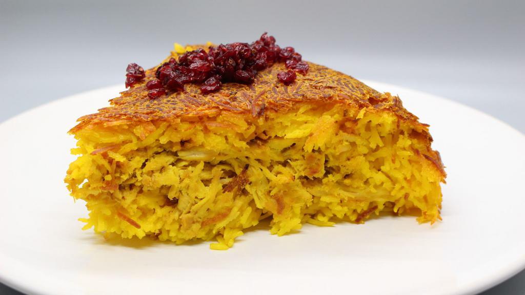 Tahchin With Chicken · Cake like mixture of rice, yogurt, chicken breast strips with fried onions, saffron, and egg yokes topped with barberries cut in big slices.
Gluten-Free