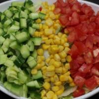 Green Salad · Chopped lettuce, tomatoes, cucumbers, corn with our special house dressing.
Vegan, Gluten-Free