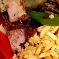 Alambre · Grilled meat with ham grilled onions & Jalapenos & Cheese. Select meat : Marinated Pork, Gri...