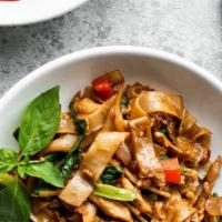 Drunken Noodle / Kee-Mao · Spicy. Flat rice noodles tossed with garlic, Thai chili, onions, bell peppers, and sweet bas...