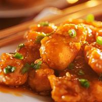 Orange Chicken · Battered deep-fried chicken with special sweet tangy sauce and green onion.