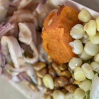 Ceviche Mixto · Fresh fish, calamari shrimp, and squid marinated in lime juices served with lettuce, yams fr...