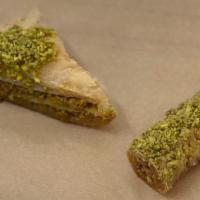 Baklava  · Mediterranean filo dough with nuts and honey. Sprinkled with pistachio crumbs.
* contains nu...
