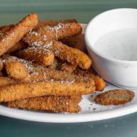 Fried Zucchini · Lightly breaded, served with marinara sauce or ranch dressing