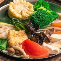 Healthy Veggie Hot Soup · Vegetarian. Taiwanese cabbage, vermicelli, enoki mushroom, tomato, corn, lotus root, fried t...