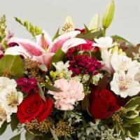Date Night On The Town · This arrangement of roses, stargazer lilies, carnations, and alstroemeria's is a delightful ...
