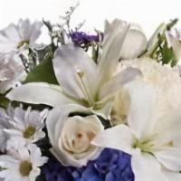 Beautiful Blue Bouquet · This elegant bouquet will be a lovely addition for any occasion. The beautiful blue flowers ...