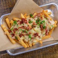 Chowder Bacon Fries · Battered fries topped with chowder and bacon.