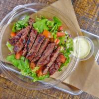 Marinated Skirt Steak Bowl · Drizzled with wasabi sauce, ginger-teriyaki mixed in, with lettuce, tomato over warm white s...