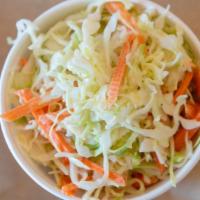 Coleslaw · A mixture of chopped green cabbage, carrots, a bit of mayonnaise, and a bit of vinegar.