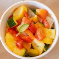 Sauteed Vegetables · A mixture of sauteed chopped vegetables. Includes onion, red bell pepper, tomato, yellow squ...