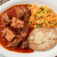 Chile Colorado · Lean beef seasoned Mexican style and slowly cooked in our salsa roja. Served with rice, refr...
