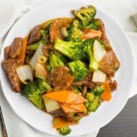 Beef With Broccoli · Tender slice beef with broccoli carrots and onion stir fried in brown sauce.